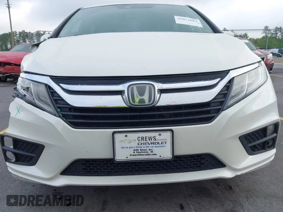 2019 Honda Odyssey EX-L with VIN 5FNRL6H70KB083596, listed as a IAAI auction lot 42072667 with 153,087 mi miles and . Bid and sale history available at DreamBid. Image 6.