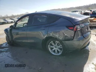 2023 Tesla Model Y Long Range z VIN 7SAYGDEE7PF822934, wystawiony jako Copart lot #49285285 z przebiegiem Nie podano mil oraz Szkoda całkowita • Salvage title. Historia ofert i sprzedaży dostępna na DreamBid. Obrazek 2.