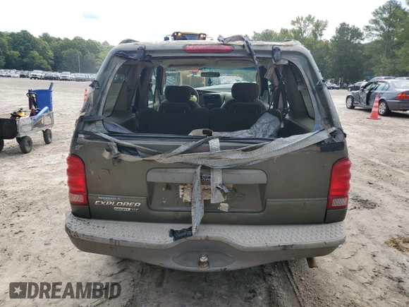 2003 Ford Explorer Sport XLS z VIN 1FMYU60E03UC12105, wystawiony jako Copart lot #67044604 z przebiegiem 277 642 mil mil oraz Szkody całkowita. Historia ofert i sprzedaży dostępna na DreamBid. Obrazek 6.