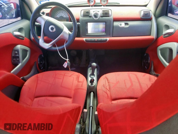 2009 Smart fortwo Pure with VIN WMEEJ31X79K271222, listed as a Copart auction lot 64583695 with 152,626 mi miles and Clean title. Bid and sale history available at DreamBid. Image 8.