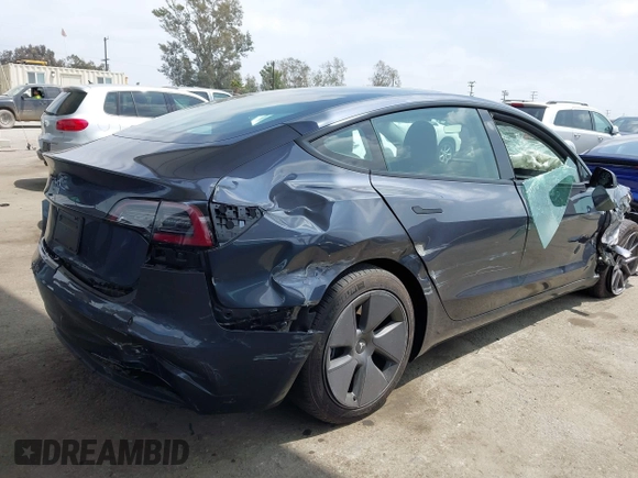 2023 Tesla Model 3 with VIN 5YJ3E1EA0PF518904, listed as a IAAI auction lot 42058540 with 20,945 mi miles and . Bid and sale history available at DreamBid. Image 18.