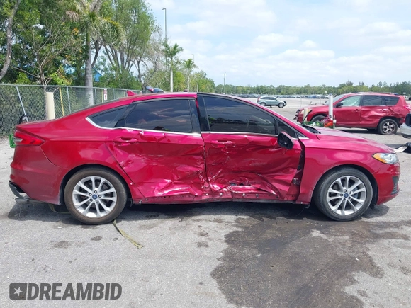 2020 Ford Fusion SE with VIN 3FA6P0HD5LR164755, listed as a IAAI auction lot 42092028 with 96,959 mi miles and . Bid and sale history available at DreamBid. Image 14.