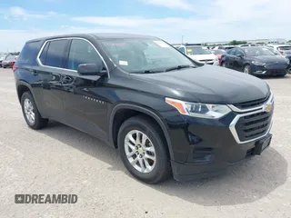 2019 Chevrolet Traverse LS z VIN 1GNERFKWXKJ301749, wystawiony jako IAAI lot #42017638 z przebiegiem 98 408 mil mil oraz . Historia ofert i sprzedaży dostępna na DreamBid. Obrazek 1.
