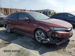 2018 Honda Clarity z VIN JHMZC5F1XJC022498, wystawiony jako Copart lot #53573485 z przebiegiem 81 470 mil mil oraz Szkoda całkowita • Salvage title. Historia ofert i sprzedaży dostępna na DreamBid. Obrazek 4.