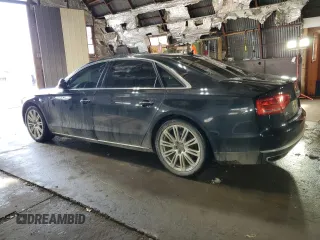2013 Audi A8 4.0L с VIN WAUR2AFD0DN010633, выставлен на аукционе Copart как лот 47470525 с пробегом 127 801 миль миль и Списание • Salvage title. История ставок и продаж доступна на DreamBid. Изображение 2.