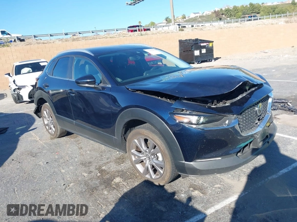 2023 Mazda CX-30 S Select with VIN 3MVDMBBM8PM514475, listed as a IAAI auction lot 41664456 with 33,076 mi miles and . Bid and sale history available at DreamBid. Image 1.