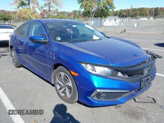 2021 Honda Civic Sedan LX with VIN 2HGFC2F69MH506308, listed as a IAAI auction lot 40560964 with 23,397 mi miles. Bid and sale history available at carsss.com. Image 1.