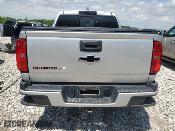 2019 Chevrolet Colorado 4WD LT with VIN 1GCGTCEN7K1361363, listed as a Copart auction lot 58660195 with Not provided miles and Salvage title. Bid and sale history available at DreamBid. Image 6.