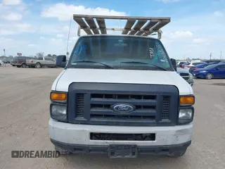 2013 Ford Econoline Cargo Commercial with VIN 1FTSE3EL4DDA38215, listed as a IAAI auction lot 41627924 with 181,821 mi miles. Bid and sale history available at carsss.com. Image 12.