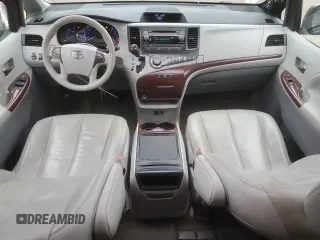 2014 Toyota Sienna XLE with VIN 5TDYK3DC1ES492724, listed as a Copart auction lot 51605245 with 112,079 mi miles and Salvage Title. Bid and sale history available at carsss.com. Image 8.