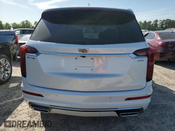 2024 Cadillac XT6 FWD Premium Luxury with VIN 1GYKPCRS1RZ700963, listed as a Copart auction lot 49031094 with 2,977 mi miles and Salvage Title. Bid and sale history available at carsss.com. Image 6.