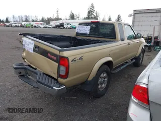 1999 Nissan Frontier XE z VIN 1N6ED26Y6XC307228, wystawiony jako IAAI lot #41804816 z przebiegiem 62 863 mil mil oraz . Historia ofert i sprzedaży dostępna na DreamBid. Obrazek 4.