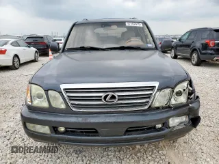 2003 Lexus LX 470 z VIN JTJHT00W033530306, wystawiony jako Copart lot #57162675 z przebiegiem 185 458 mil mil oraz Szkody całkowita. Historia ofert i sprzedaży dostępna na DreamBid. Obrazek 5.