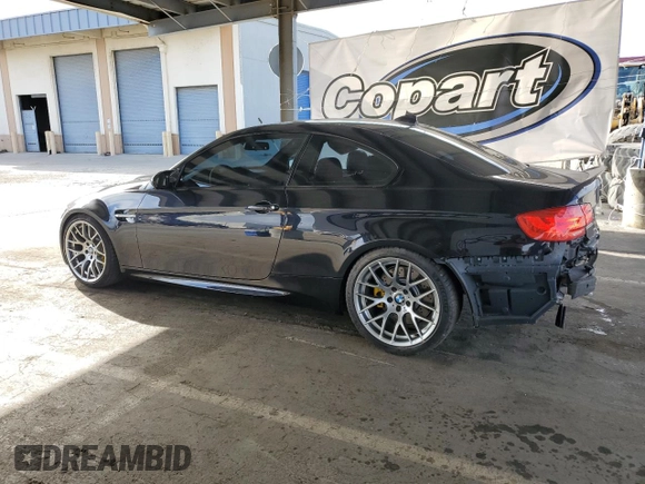 2012 BMW M3 with VIN WBSKG9C57CE798240, listed as a Copart auction lot 61774515 with 83,322 mi miles and Salvage title. Bid and sale history available at DreamBid. Image 2.