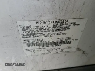 2014 Ford Taurus SEL with VIN 1FAHP2E82EG139480, listed as a Copart auction lot 52765215 with 114,600 mi miles and Salvage Title. Bid and sale history available at carsss.com. Image 12.