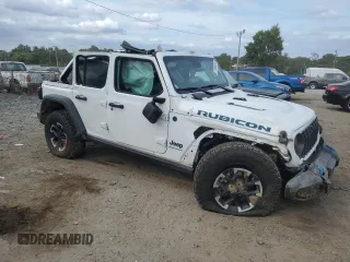 2024 Jeep Wrangler Rubicon with VIN 1C4RJXR67RW171200, listed as a Copart auction lot 71599434 with Not Provided miles and Salvage Title. Bid and sale history available at DreamBid. Image 4.