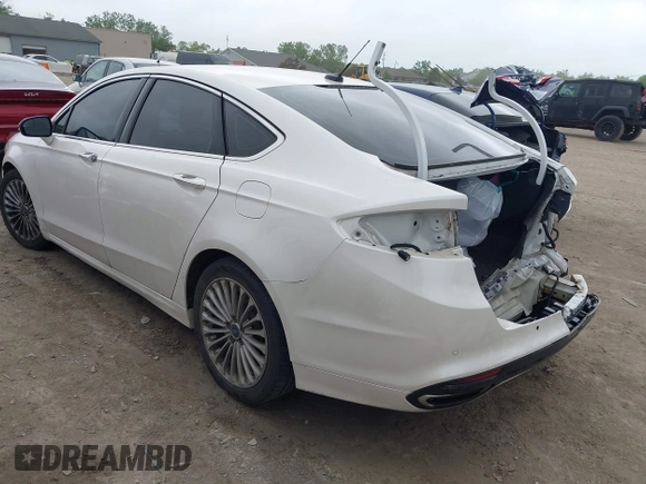 2016 Ford Fusion Titanium with VIN 3FA6P0K96GR103571, listed as a IAAI auction lot 42340764 with 180,870 mi miles and . Bid and sale history available at DreamBid. Image 3.
