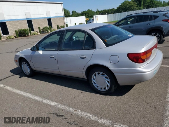 2000 Saturn SL z VIN 1G8ZK5279YZ252761, wystawiony jako Copart lot #63204475 z przebiegiem 80 646 mil mil oraz Czysty tytuł • Clean title. Historia ofert i sprzedaży dostępna na DreamBid. Obrazek 2.