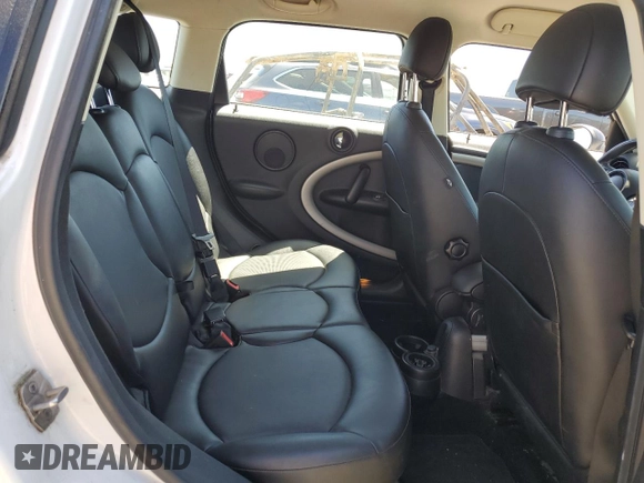 2015 MINI Countryman with VIN WMWZB3C55FWR44759, listed as a Copart auction lot 55836815 with 102,472 mi miles and Salvage title. Bid and sale history available at DreamBid. Image 10.