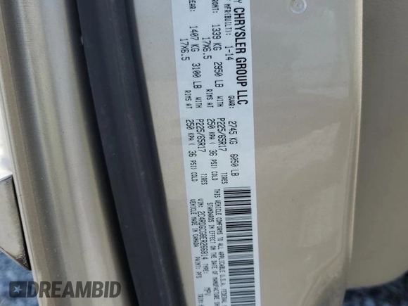 2014 Dodge Grand Caravan SXT z VIN 2C4RDGCG8ER266814, wystawiony jako Copart lot #52053155 z przebiegiem 279 551 mil mil oraz Tytuł czysty. Historia ofert i sprzedaży dostępna na DreamBid. Obrazek 13.