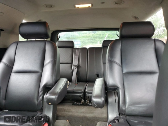 2010 Chevrolet Tahoe LTZ with VIN 1GNUKCE05AR164175, listed as a Copart auction lot 57223295 with 423,010 mi miles and Salvage title. Bid and sale history available at DreamBid. Image 10.