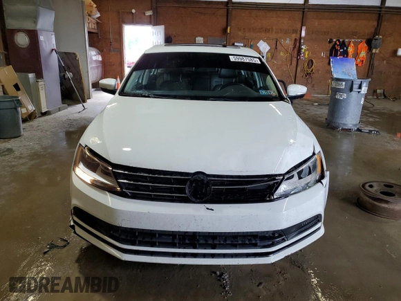 2015 Volkswagen Jetta SE with VIN 3VWD17AJ4FM308693, listed as a Copart auction lot 59987585 with 87,136 mi miles and Salvage title. Bid and sale history available at DreamBid. Image 5.