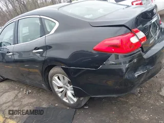 2011 Infiniti M z VIN JN1BY1AP8BM322290, wystawiony jako IAAI lot #41864491 z przebiegiem 195 826 mil mil oraz . Historia ofert i sprzedaży dostępna na DreamBid. Obrazek 13.