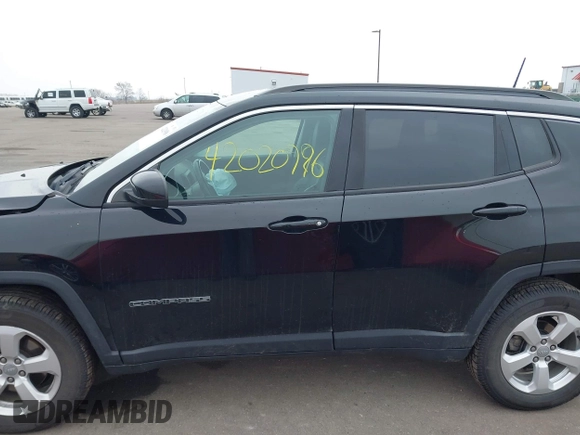 2018 Jeep Compass Altitude with VIN 3C4NJDBB9JT202297, listed as a IAAI auction lot 42020996 with 59,461 mi miles and . Bid and sale history available at DreamBid. Image 14.