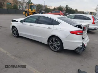 2020 Ford Fusion Titanium with VIN 3FA6P0K92LR103416, listed as a IAAI auction lot 41681810 with 54,902 mi miles and . Bid and sale history available at DreamBid. Image 3.
