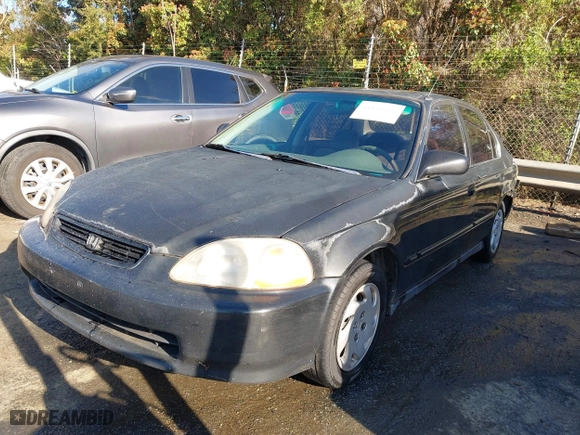 1997 Honda Civic EX with VIN 2HGEJ8645VH566736, listed as a IAAI auction lot 41876647 with 277,968 mi miles. Bid and sale history available at carsss.com. Image 17.