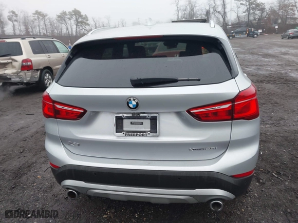 2021 BMW X1 xDrive28i with VIN WBXJG9C04M5T79810, listed as a IAAI auction lot 41471536 with 75,345 mi miles. Bid and sale history available at carsss.com. Image 16.