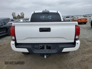 2018 Toyota Tacoma SR z VIN 3TMCZ5AN5JM181489, wystawiony jako Copart lot #55696365 z przebiegiem 70 091 mil mil oraz Szkoda całkowita • Salvage title. Historia ofert i sprzedaży dostępna na DreamBid. Obrazek 6.