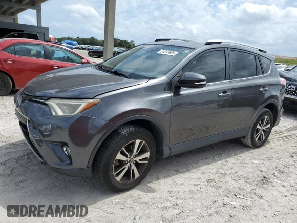 2018 Toyota RAV4 XLE with VIN JTMWFREV1JJ742694, listed as a Copart auction lot 51093695 with 74,502 mi miles and Salvage Title. Bid and sale history available at DreamBid. Image 1.