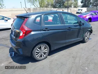 2015 Honda Fit EX-L with VIN 3HGGK5H85FM771741, listed as a IAAI auction lot 42095869 with 91,854 mi miles and . Bid and sale history available at DreamBid. Image 4.