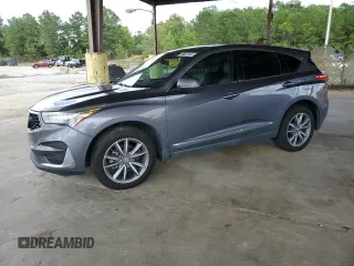 2020 Acura RDX Technology with VIN 5J8TC1H54LL004003, listed as a Copart auction lot 61156075 with 135,236 mi miles and Clean title. Bid and sale history available at DreamBid. Image 1.