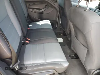 2018 Ford Escape S with VIN 1FMCU0F78JUB79464, listed as a Copart auction lot 58812925 with 104,642 mi miles and Salvage title. Bid and sale history available at DreamBid. Image 11.