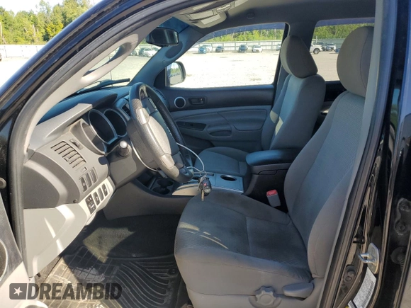 2013 Toyota Tacoma with VIN 3TMMU4FNXDM054585, listed as a Copart auction lot 65691205 with 183,075 mi miles and Clean title. Bid and sale history available at DreamBid. Image 7.