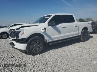 2023 Ford F-150 Lightning Pro z VIN 1FT6W1EV3PWG34249, wystawiony jako Copart lot #46901535 z przebiegiem 9389 mil mil oraz Szkody całkowita. Historia ofert i sprzedaży dostępna na DreamBid. Obrazek 1.