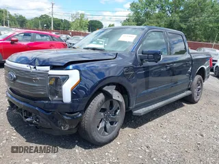 2023 Ford F-150 Lightning Pro с VIN 1FT6W1EVXPWG42428, выставлен на аукционе IAAI как лот 39711091 с пробегом 6 308 миль миль и . История ставок и продаж доступна на DreamBid. Изображение 23.