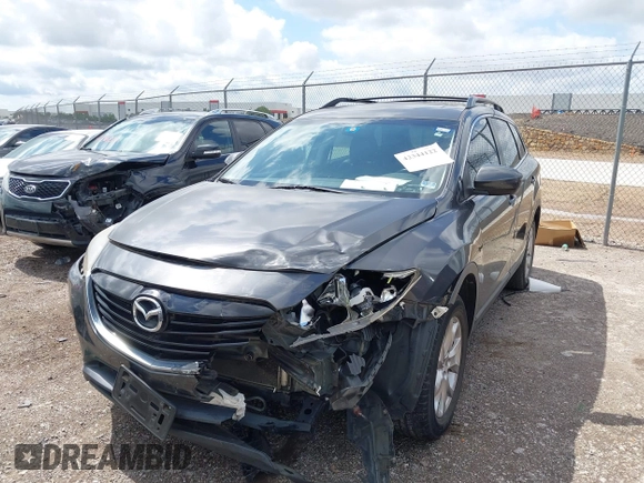 2015 Mazda CX-9 Touring with VIN JM3TB2CA7F0460232, listed as a IAAI auction lot 42344122 with 103,478 mi miles and . Bid and sale history available at DreamBid. Image 18.