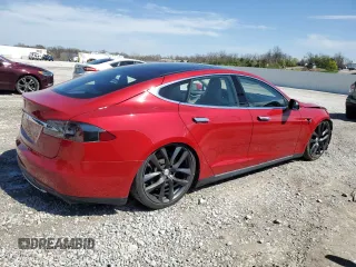 2014 Tesla Model S 60 with VIN 5YJSA1S12EFP65799, listed as a Copart auction lot 50895235 with 132,669 mi miles and Salvage Title. Bid and sale history available at DreamBid. Image 3.