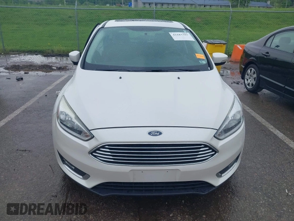 2016 Ford Focus Titanium с VIN 1FADP3N26GL387872, выставлен на аукционе IAAI как лот 42183397 с пробегом 30 557 миль миль и . История ставок и продаж доступна на DreamBid. Изображение 12.