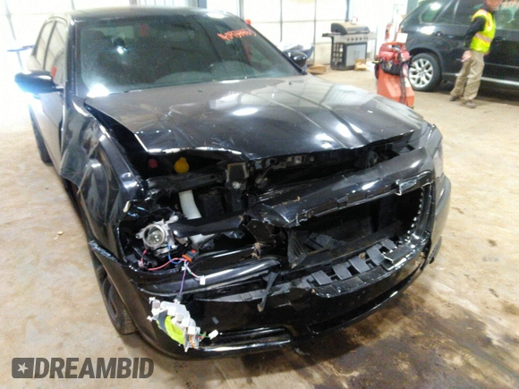 2014 Chrysler 300 S with VIN 2C3CCABG2EH343503, listed as a IAAI auction lot 40934463 with 128,876 mi miles and . Bid and sale history available at carsss.com. Image 6.