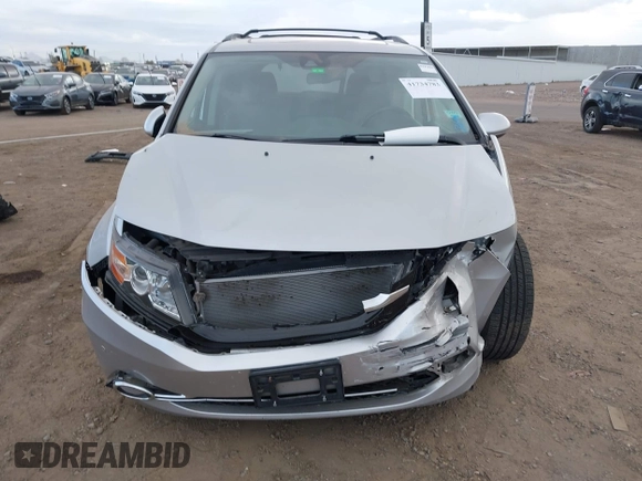 2014 Honda Odyssey Touring with VIN 5FNRL5H93EB066162, listed as a IAAI auction lot 41734783 with 173,063 mi miles and . Bid and sale history available at DreamBid. Image 12.
