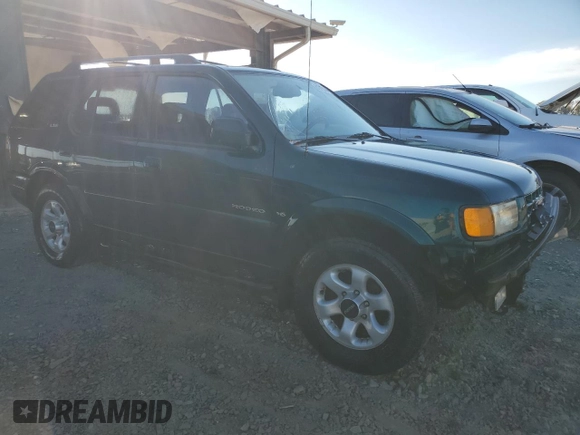 1999 Isuzu Rodeo S с VIN 4S2CK58W6X4352441, выставлен на аукционе Copart как лот 81915384 с пробегом 338 513 миль миль и На запчасти • Non repairable. История ставок и продаж доступна на DreamBid. Изображение 4.