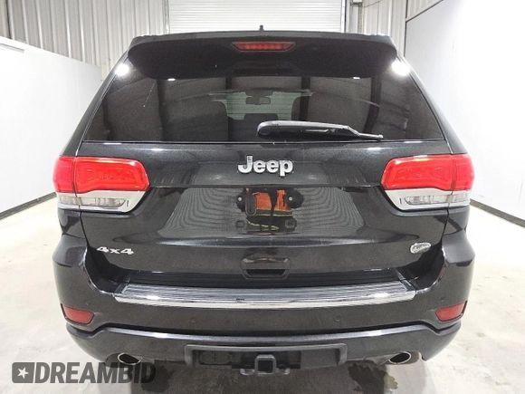 2014 Jeep Grand Cherokee Overland with VIN 1C4RJFCGXEC153250, listed as a Copart auction lot 51327195 with 132,282 mi miles and Clean Title. Bid and sale history available at DreamBid. Image 6.