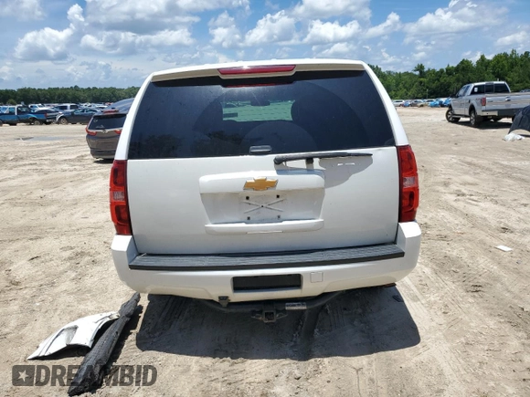 2014 Chevrolet Tahoe Commercial with VIN 1GNLC2E04ER202441, listed as a Copart auction lot 61310725 with 117,443 mi miles and Salvage title. Bid and sale history available at DreamBid. Image 6.