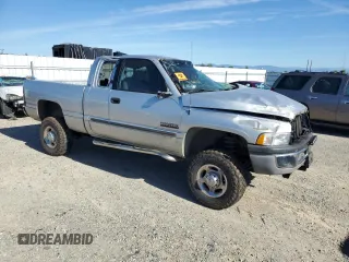 2001 Dodge 2500 z VIN 3B7KF23691G767197, wystawiony jako Copart lot #56122385 z przebiegiem 205 557 mil mil oraz Nie do naprawy • Non repairable. Historia ofert i sprzedaży dostępna na DreamBid. Obrazek 4.