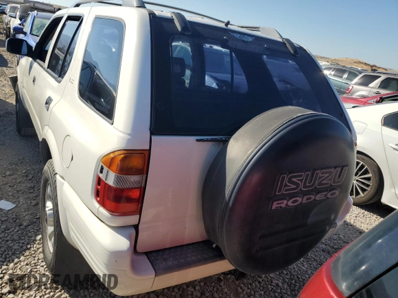 1999 Isuzu Rodeo S with VIN 4S2CM58W0X4306727, listed as a Copart auction lot 74758994 with 193,850 mi miles and Clean title. Bid and sale history available at DreamBid. Image 6.