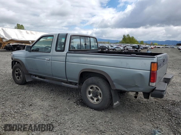 1993 Nissan Frontier SE z VIN 1N6HD16Y0PC408188, wystawiony jako Copart lot #71028394 z przebiegiem 258 939 mil mil oraz Szkoda całkowita • Salvage title. Historia ofert i sprzedaży dostępna na DreamBid. Obrazek 2.